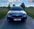 Черный Шкода Октавия, объемом двигателя 1.8 л и пробегом 164 тыс. км за 10000 $, фото 1 на Automoto.ua