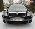 Черный Шкода Октавия, объемом двигателя 1.6 л и пробегом 235 тыс. км за 9000 $, фото 1 на Automoto.ua