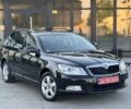 Черный Шкода Октавия, объемом двигателя 1.4 л и пробегом 184 тыс. км за 6999 $, фото 1 на Automoto.ua