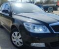 Черный Шкода Октавия, объемом двигателя 1.6 л и пробегом 200 тыс. км за 7499 $, фото 1 на Automoto.ua