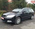 Черный Шкода Октавия, объемом двигателя 1.4 л и пробегом 215 тыс. км за 7299 $, фото 1 на Automoto.ua