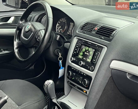 Черный Шкода Октавия, объемом двигателя 2 л и пробегом 234 тыс. км за 8899 $, фото 54 на Automoto.ua