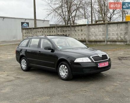 Черный Шкода Октавия, объемом двигателя 1.6 л и пробегом 155 тыс. км за 7500 $, фото 1 на Automoto.ua