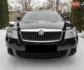 Черный Шкода Октавия, объемом двигателя 1.6 л и пробегом 235 тыс. км за 9000 $, фото 1 на Automoto.ua