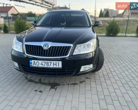 Шкода Октавия 2012 в Мукачеве на Automoto.ua Черный Шкода Октавия, объемом двигателя 1.6 л и пробегом 280 тыс. км за 7700 $, фото 1 на Automoto.ua