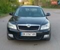 Черный Шкода Октавия, объемом двигателя 1.8 л и пробегом 196 тыс. км за 7200 $, фото 1 на Automoto.ua