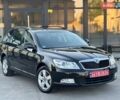 Черный Шкода Октавия, объемом двигателя 1.4 л и пробегом 184 тыс. км за 6999 $, фото 1 на Automoto.ua