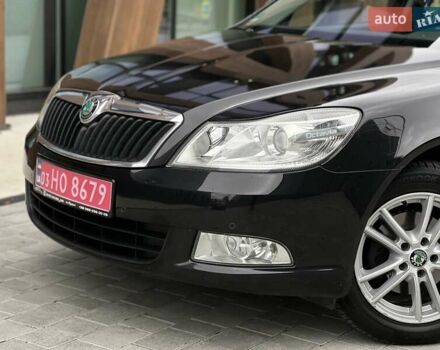 Черный Шкода Октавия, объемом двигателя 1.8 л и пробегом 195 тыс. км за 9750 $, фото 1 на Automoto.ua