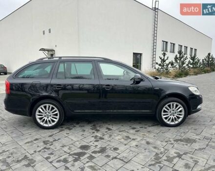 Черный Шкода Октавия, объемом двигателя 2 л и пробегом 220 тыс. км за 12500 $, фото 11 на Automoto.ua