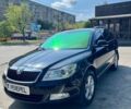 Черный Шкода Октавия, объемом двигателя 1.6 л и пробегом 223 тыс. км за 9000 $, фото 1 на Automoto.ua