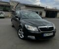 Черный Шкода Октавия, объемом двигателя 2 л и пробегом 320 тыс. км за 9500 $, фото 1 на Automoto.ua