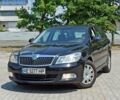 Черный Шкода Октавия, объемом двигателя 1.6 л и пробегом 213 тыс. км за 7850 $, фото 1 на Automoto.ua