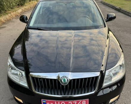 Черный Шкода Октавия, объемом двигателя 2 л и пробегом 217 тыс. км за 10550 $, фото 3 на Automoto.ua