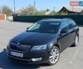 Черный Шкода Октавия, объемом двигателя 1.6 л и пробегом 200 тыс. км за 12500 $, фото 1 на Automoto.ua