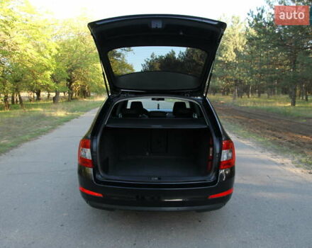 Чорний Шкода Октавія, об'ємом двигуна 1.6 л та пробігом 218 тис. км за 10800 $, фото 11 на Automoto.ua