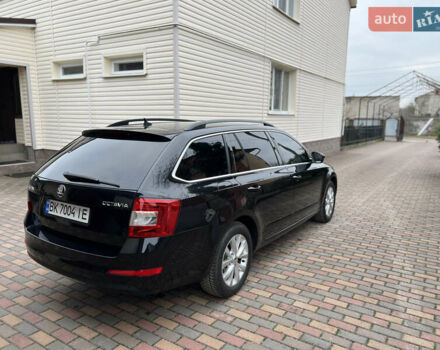 Черный Шкода Октавия, объемом двигателя 2 л и пробегом 312 тыс. км за 13500 $, фото 6 на Automoto.ua