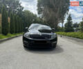 Черный Шкода Октавия, объемом двигателя 2 л и пробегом 248 тыс. км за 11500 $, фото 2 на Automoto.ua