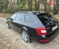 Черный Шкода Октавия, объемом двигателя 1.6 л и пробегом 193 тыс. км за 12345 $, фото 2 на Automoto.ua
