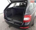 Черный Шкода Октавия, объемом двигателя 1.6 л и пробегом 299 тыс. км за 9600 $, фото 1 на Automoto.ua