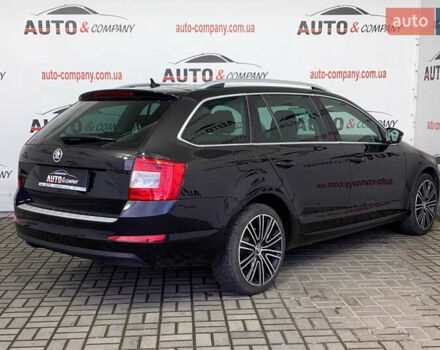 Чорний Шкода Октавія, об'ємом двигуна 1.6 л та пробігом 221 тис. км за 12250 $, фото 2 на Automoto.ua