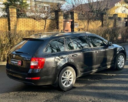 Черный Шкода Октавия, объемом двигателя 1.6 л и пробегом 227 тыс. км за 12790 $, фото 7 на Automoto.ua