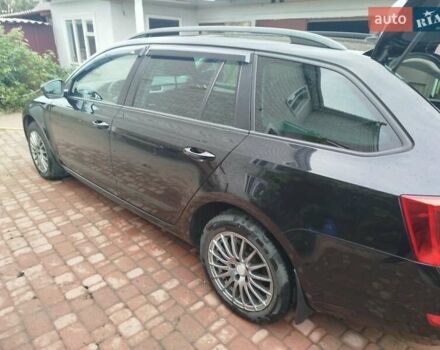 Черный Шкода Октавия, объемом двигателя 1.6 л и пробегом 307 тыс. км за 10499 $, фото 2 на Automoto.ua