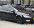 Черный Шкода Октавия, объемом двигателя 2 л и пробегом 265 тыс. км за 12800 $, фото 1 на Automoto.ua