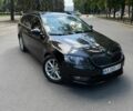 Черный Шкода Октавия, объемом двигателя 1.6 л и пробегом 235 тыс. км за 12542 $, фото 1 на Automoto.ua