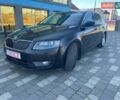 Черный Шкода Октавия, объемом двигателя 2 л и пробегом 205 тыс. км за 9700 $, фото 1 на Automoto.ua