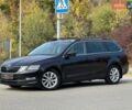 Черный Шкода Октавия, объемом двигателя 2 л и пробегом 245 тыс. км за 14999 $, фото 1 на Automoto.ua
