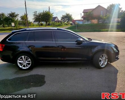 Чорний Шкода Октавія, об'ємом двигуна 1.6 л та пробігом 260 тис. км за 13499 $, фото 2 на Automoto.ua