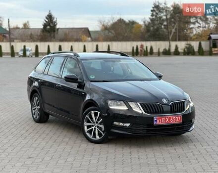 Черный Шкода Октавия, объемом двигателя 2 л и пробегом 241 тыс. км за 16500 $, фото 1 на Automoto.ua