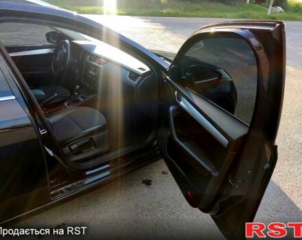 Чорний Шкода Октавія, об'ємом двигуна 1.6 л та пробігом 260 тис. км за 13499 $, фото 4 на Automoto.ua