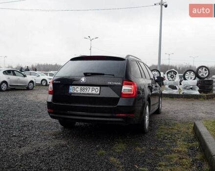Черный Шкода Октавия, объемом двигателя 2 л и пробегом 326 тыс. км за 14141 $, фото 7 на Automoto.ua