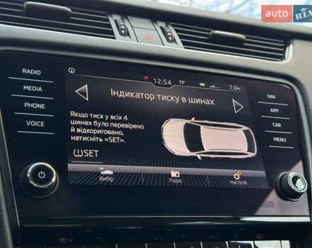 Чорний Шкода Октавія, об'ємом двигуна 2 л та пробігом 218 тис. км за 15299 $, фото 114 на Automoto.ua