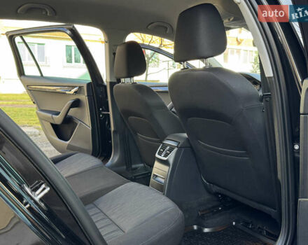 Чорний Шкода Октавія, об'ємом двигуна 2 л та пробігом 218 тис. км за 15299 $, фото 150 на Automoto.ua