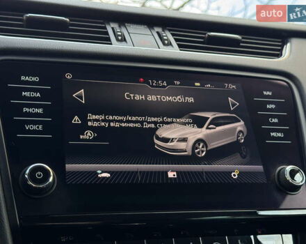 Чорний Шкода Октавія, об'ємом двигуна 2 л та пробігом 218 тис. км за 15299 $, фото 110 на Automoto.ua