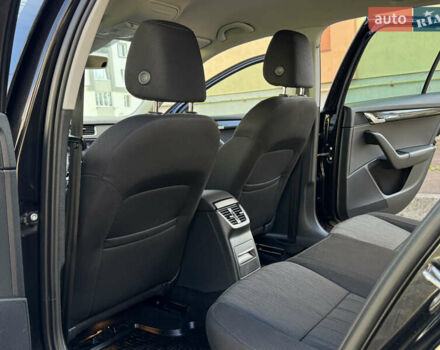 Чорний Шкода Октавія, об'ємом двигуна 2 л та пробігом 218 тис. км за 15299 $, фото 140 на Automoto.ua