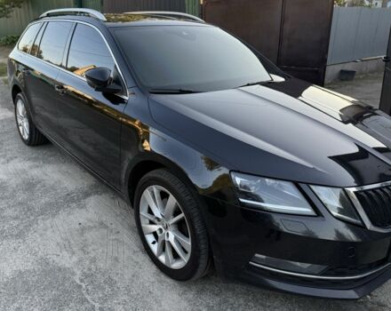 Черный Шкода Октавия, объемом двигателя 2 л и пробегом 320 тыс. км за 18000 $, фото 1 на Automoto.ua