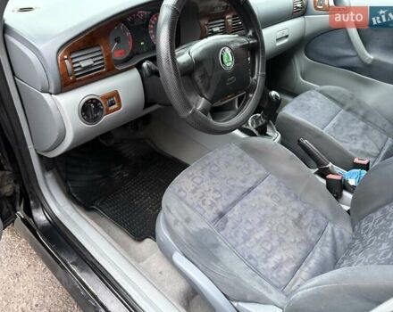 Черный Шкода Октавия, объемом двигателя 1.6 л и пробегом 235 тыс. км за 3450 $, фото 12 на Automoto.ua