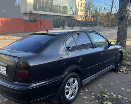 Черный Шкода Октавия, объемом двигателя 1.6 л и пробегом 200 тыс. км за 2300 $, фото 4 на Automoto.ua