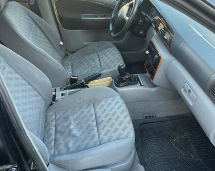 Черный Шкода Октавия, объемом двигателя 1.6 л и пробегом 200 тыс. км за 2300 $, фото 5 на Automoto.ua