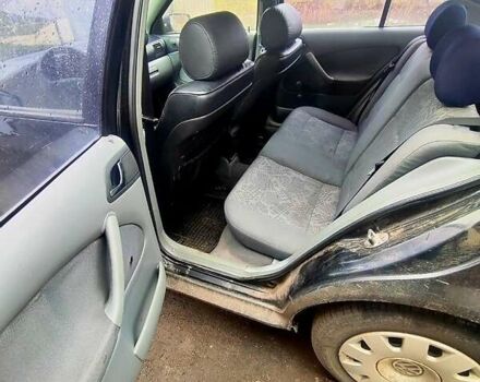 Черный Шкода Октавия, объемом двигателя 1.6 л и пробегом 300 тыс. км за 2800 $, фото 2 на Automoto.ua