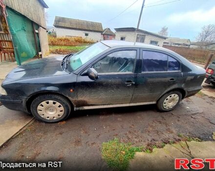 Черный Шкода Октавия, объемом двигателя 1.6 л и пробегом 300 тыс. км за 2800 $, фото 1 на Automoto.ua