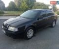 Черный Шкода Октавия, объемом двигателя 1.8 л и пробегом 250 тыс. км за 3600 $, фото 1 на Automoto.ua