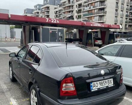 Черный Шкода Октавия, объемом двигателя 2 л и пробегом 311 тыс. км за 4000 $, фото 1 на Automoto.ua