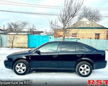 Черный Шкода Октавия, объемом двигателя 1.8 л и пробегом 200 тыс. км за 3999 $, фото 5 на Automoto.ua