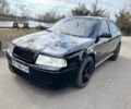 Черный Шкода Октавия, объемом двигателя 1.6 л и пробегом 194 тыс. км за 5350 $, фото 1 на Automoto.ua