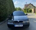 Черный Шкода Октавия, объемом двигателя 2 л и пробегом 395 тыс. км за 4600 $, фото 1 на Automoto.ua