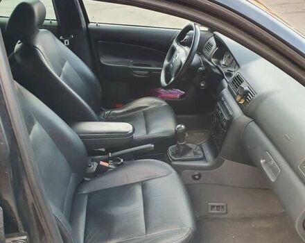 Черный Шкода Октавия, объемом двигателя 1.8 л и пробегом 281 тыс. км за 5500 $, фото 7 на Automoto.ua